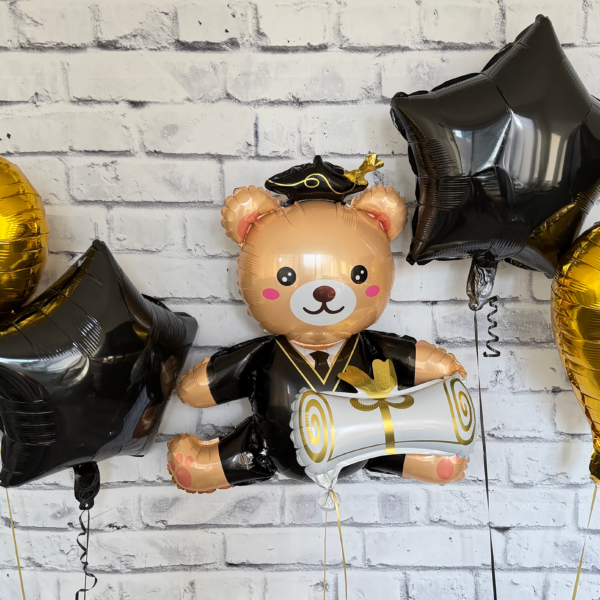 Graduation teddy bear balloon bouquet with gold hearts and stars