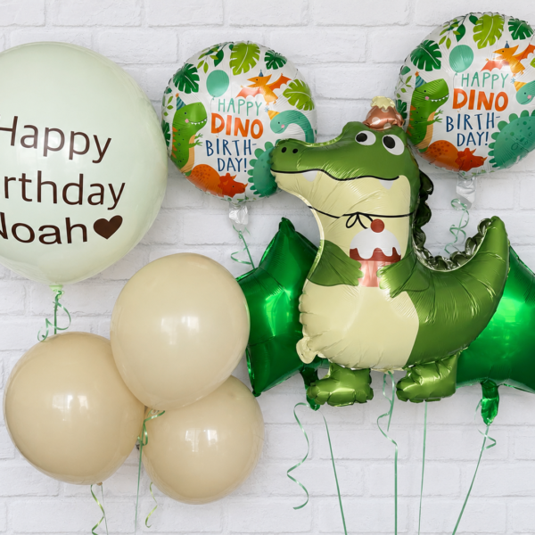 Personalized dinosaur balloon bouquet with custom name